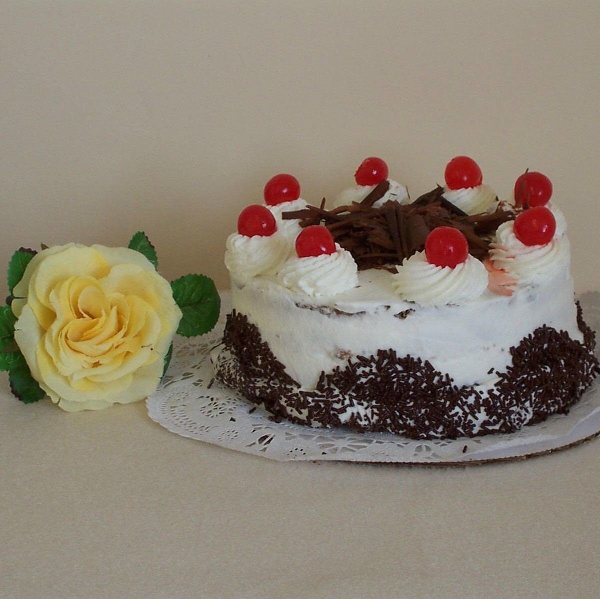 Half kg Black Forest cake and single rose